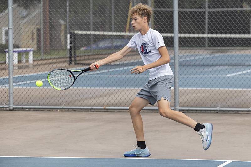 Aaron Rivera returns a ball Wednesday, July 27, 2023 while playing mixed doubles in the Emma Hubbs Tennis Classic in Dixon.