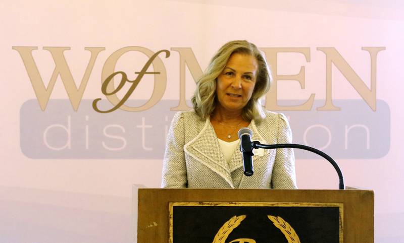 Award recipient Dianna Torman speaks during the Northwest Herald's Women of Distinction award luncheon Wednesday June 5, 2024, at Boulder Ridge Country Club, in Lake in the Hills. The luncheon recognized 11 women in the community as Women of Distinction.