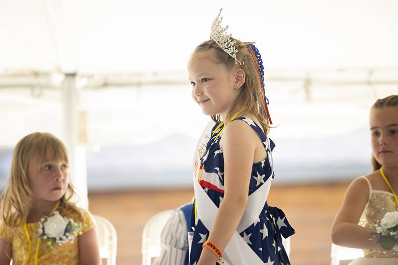 Sydney Buckingham, 5, walks the stage after being named Little Miss on Thursday, June 13, 2024, during Polo’s Town and Country Days. Sydney beat out nine other girls for the title.