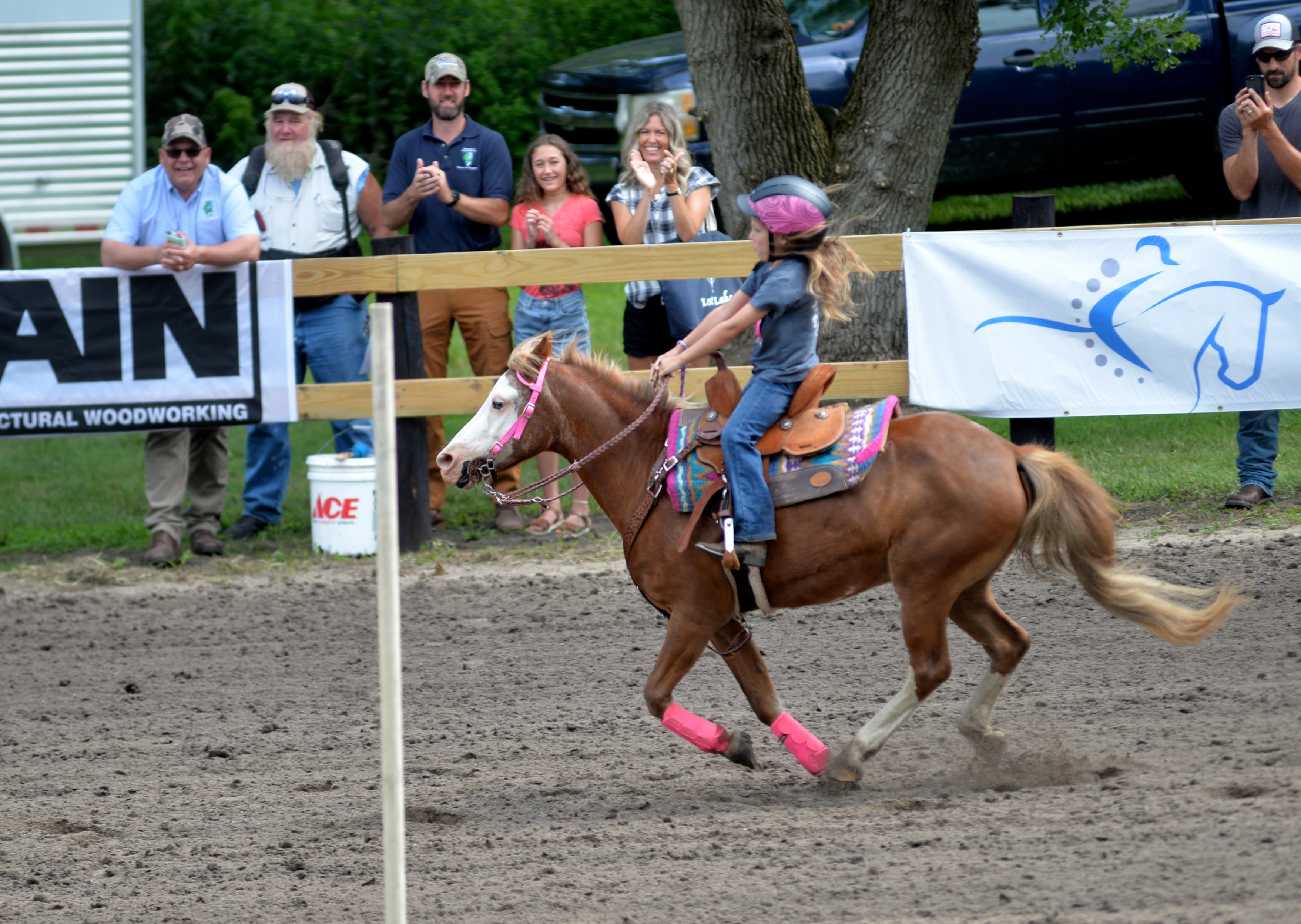 Hadley VanDermyde, 6, of Morrison, rides her pony Jubilee in the Poles Competition at the Rock River Trail & Horseman Association's Grand Opening Show on Saturday, July 20, 2024. The show was held in the newly refurbished horse arena located in Franklin Creek Natural Area, just north of Franklin Grove.