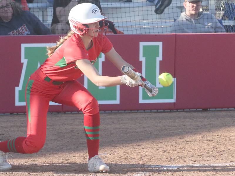 L-P's Kelsey Frederick lays down a bunt against Kewanee on Monday, March 11, 2024 at the L-P Athletic Complex in La Salle.