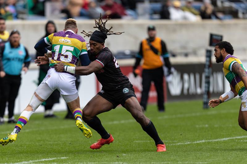 New Orleans Gold's full-back Douglas Fife (15) tries to shake Chicago Hounds'  Mataiyasi Leuta during a Major League Rugby match at Seat Geek Stadium in Bridgeview, on Sunday April 23, 2023.