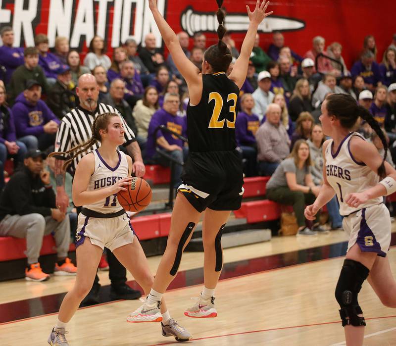 Serena's Rayelee Brennan fakes a pass over Ashton-Franklin Center's Brianna Gonnerman during the Class 1A Regional final on Thursday, Feb. 15, 2024 at Earlville High School.