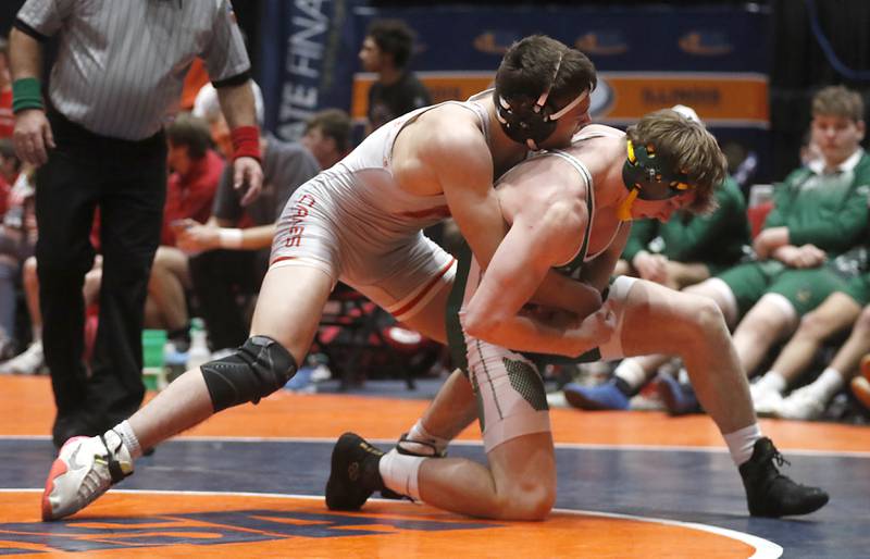 Coal City’s Landin Benson tries to spin out of the grasp of Marian Central’s Nicholas Astacio during the IHSA Class 1A Dual Team Sate Championship match Saturday, Feb. 24, 2024 at Grossinger Motors Arena in Bloomington.