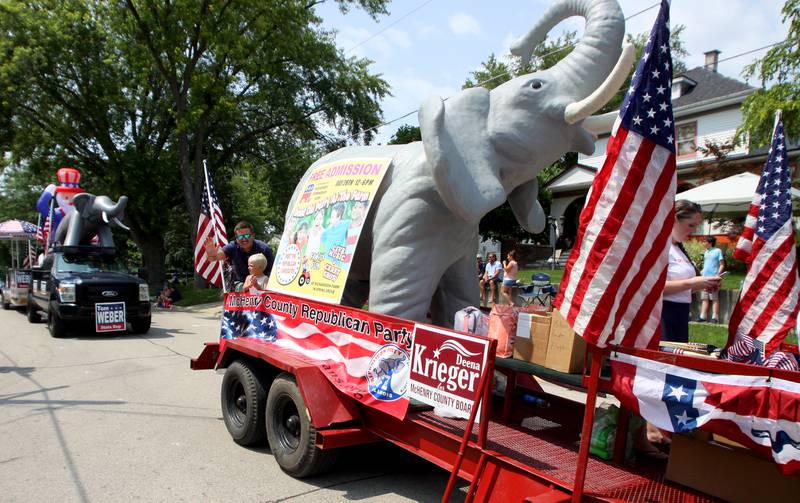 The McHenry County Republican Party float passes as part of the Fiesta Days parade along Main Street in McHenry Sunday.