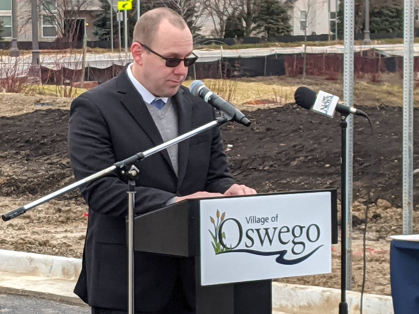 Oswego Village President Ryan Kauffman addresses those gathered at a ribbon-cutting ceremony held prior to the opening of the roundabout on Dec. 29.