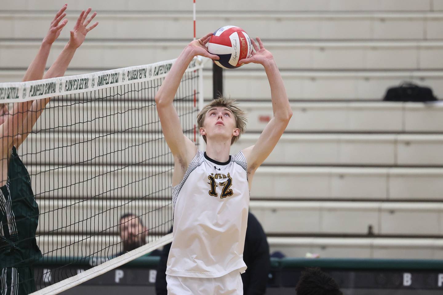 Joliet West’s Landon Brouwer sets the ball against Plainfield Central on Tuesday, April 23, 2024 in Plainfield.