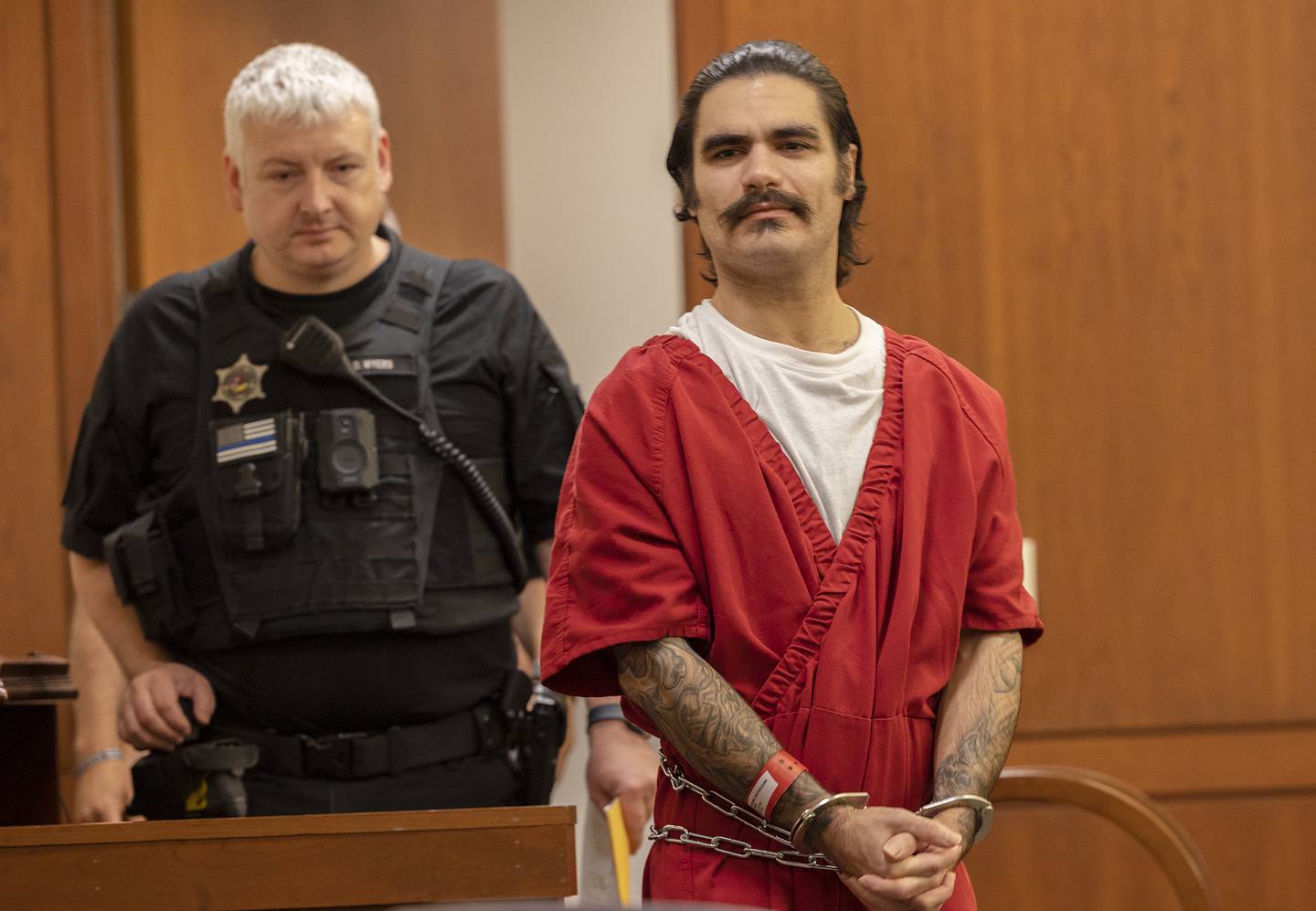 Jonathon Gounaris, 32, is brought into Ogle County court for a hearing Monday, Aug. 26, 2024, in Oregon. Gounaris is being charged with four counts of attempted first-degree murder for a shooting at Lost Lake in June.