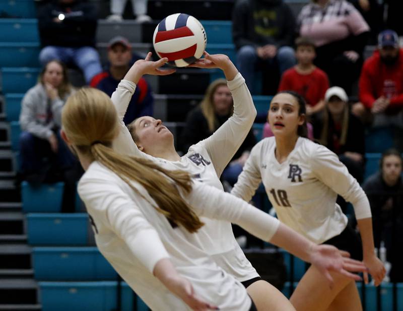 Prairie Ridge's Grace Jansen sets the ball during the Class 3A Woodstock North Sectional finals volleyball match on Wednesday, Nov. 1, 2023, at Woodstock North High School.