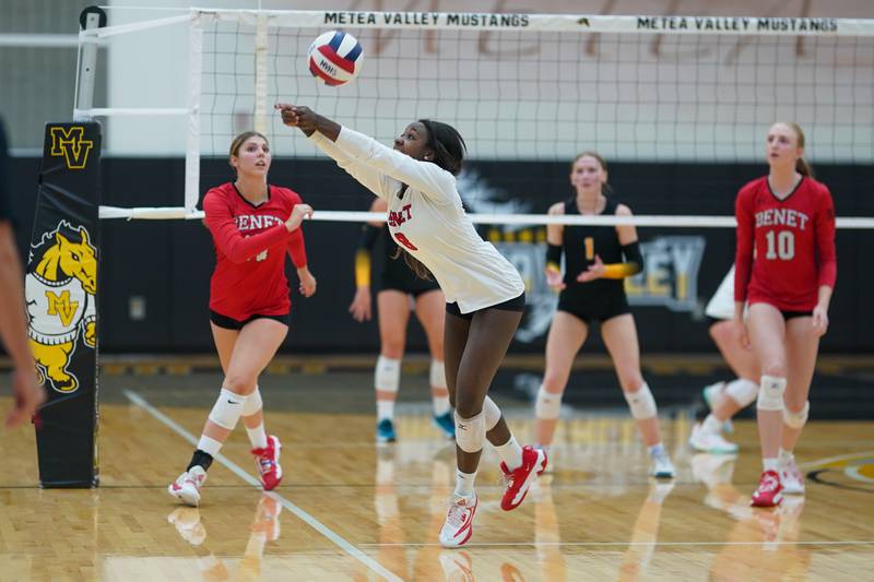 Benet’s Aniya Warren (8) bump sets the ball during a volleyball match against Metea Valley at Metea Valley High School in Aurora on Wednesday, Sep 4, 2024.