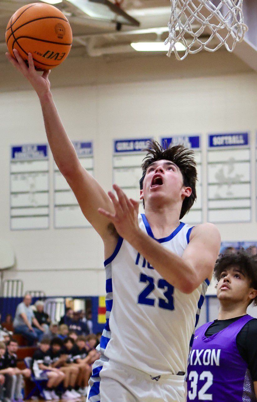 Princeton's Noah LaPorte takes in a layup Monday night at Prouty Gym. Dixon won 61-50.