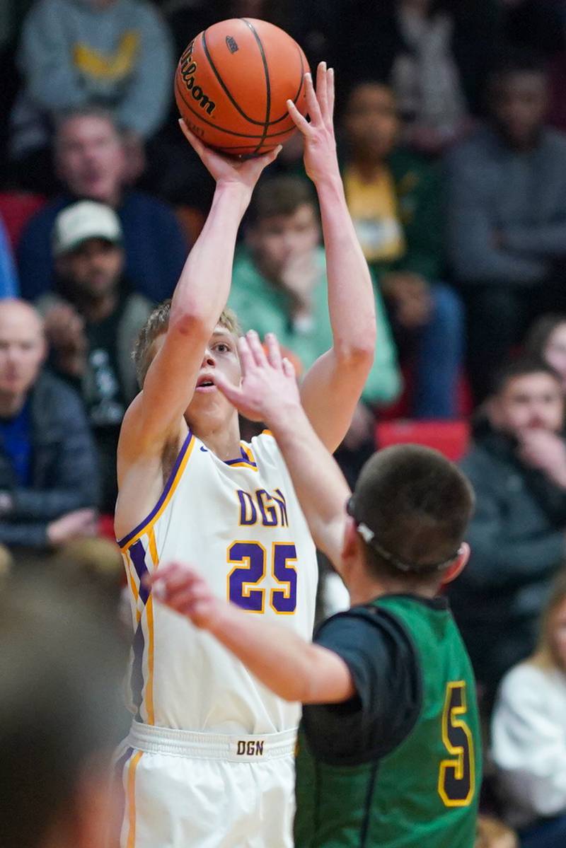 Downers Grove North's Alex Miller (25) shoots a three pointer against Waubonsie Valley during a Class 4A East Aurora sectional semifinal basketball game at East Aurora High School on Wednesday, Feb 28, 2024.