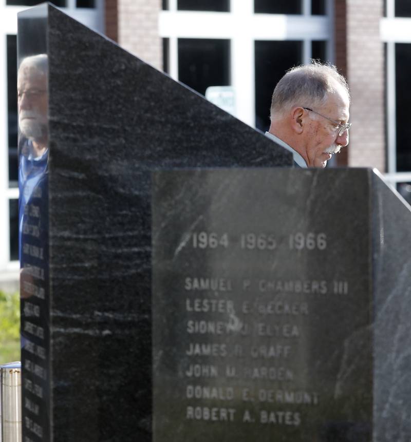 McHenry County Board member Carl Kamienski reads the names of McHenry County veterans who died in the Vietnam War are read during the “Voices from Vietnam,” program on Friday, March 29, 2024, at the McHenry County Government Administration Building in Woodstock. The program was the first time that McHenry County honored Vietnam veterans on Vietnam War Veterans Day. The day, that was created by federal law enacted in 2017, honors the more than 2.7 million American men and women who served in Vietnam.