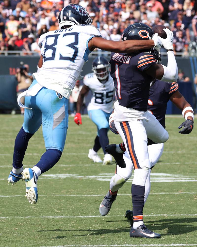 Chicago Bears cornerback Jaylon Johnson intercepts a pass intended for Tennessee Titans wide receiver Tyler Boyd sealing the win for the Bears during their game Sunday, Sept. 8, 2024, at Soldier Field in Chicago.