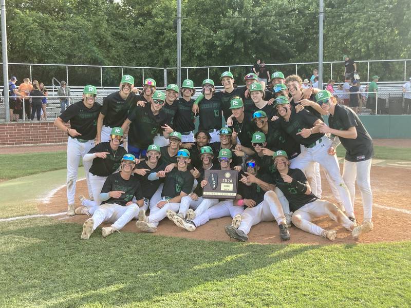 The Providence Catholic baseball team celebrates winning the sectional championship