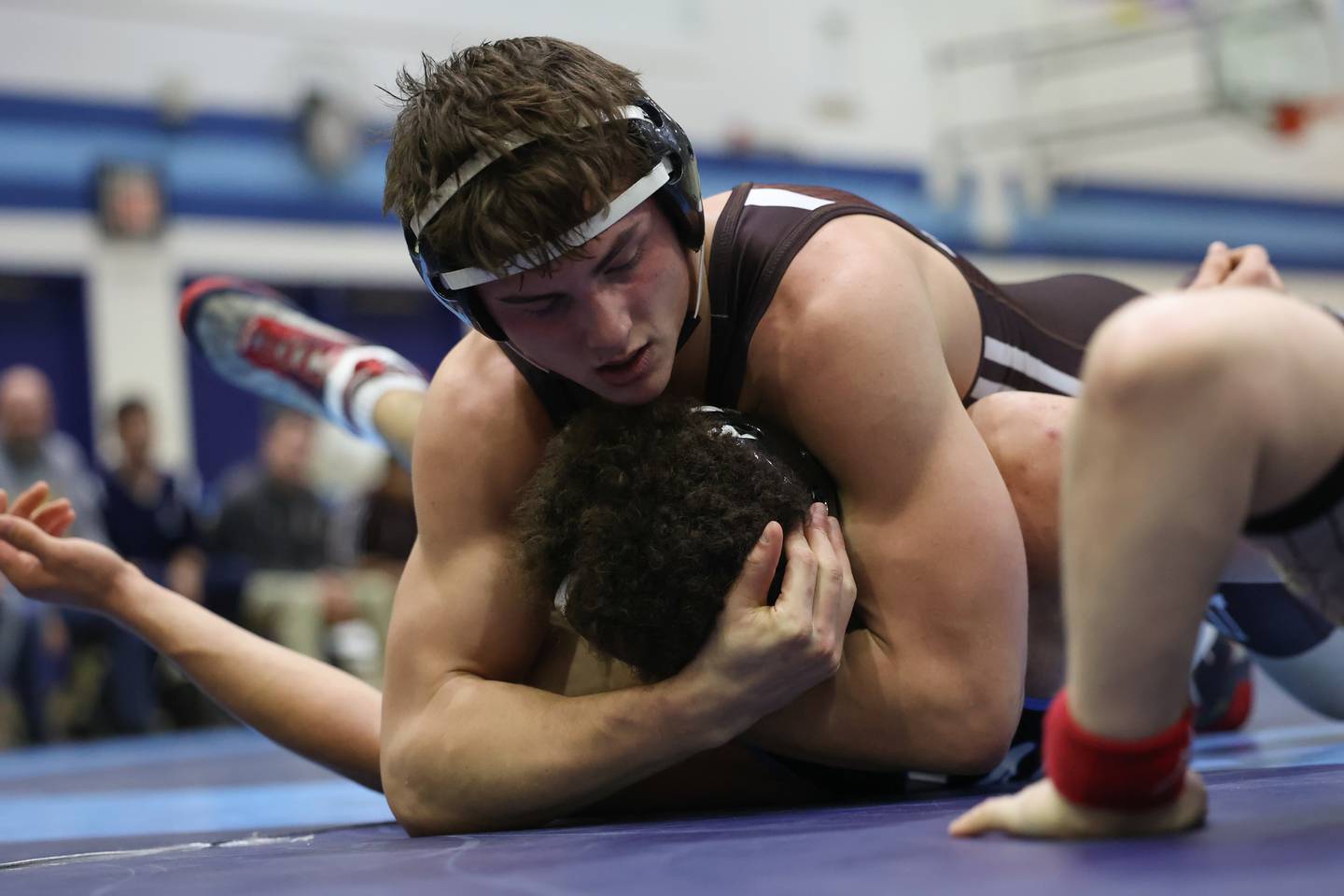 Joliet Catholic’s Nico Ronchetti Lincoln-Way East’s Isaiah Williams in the Class 3A dual team sectional at Downers Grove South High School on Tuesday, Feb. 20th 2024.