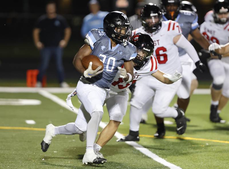 Willowbrook's Jovon Boyd (30) runs the ball during the varsity football game between Glenbard East and Willowbrook high schools on Friday, Sep. 30, 2024 in Villa Park.