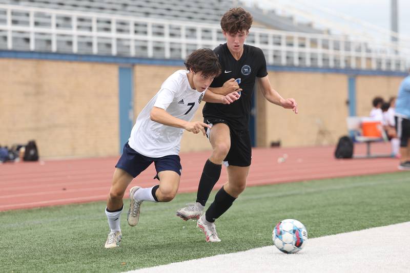 Lemont’s Tyler Chrisman makes a move around Lincoln-Way East’s Finnegan Warner in the Windy City Classic at Revis High School in Burbank on Saturday, Aug. 26, 2023.