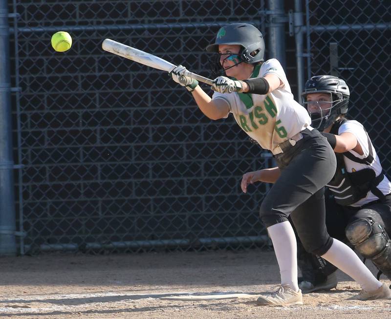 Seneca's Alyssa Zellers lays down a bunt against Putnam County on Thursday, April 13, 2023 at Seneca High School.