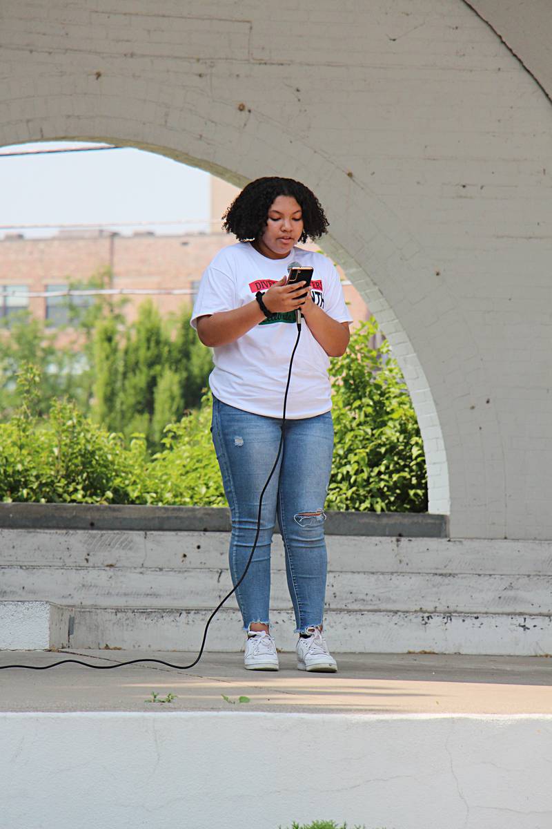 Destini Chambers reads the poem “My Black is Beautiful” Saturday, June 17, 2023 at a Juneteenth celebration in Sterling. The event celebrates the emancipation of enslaved people in the United States was held at the Grandon Civic Center.