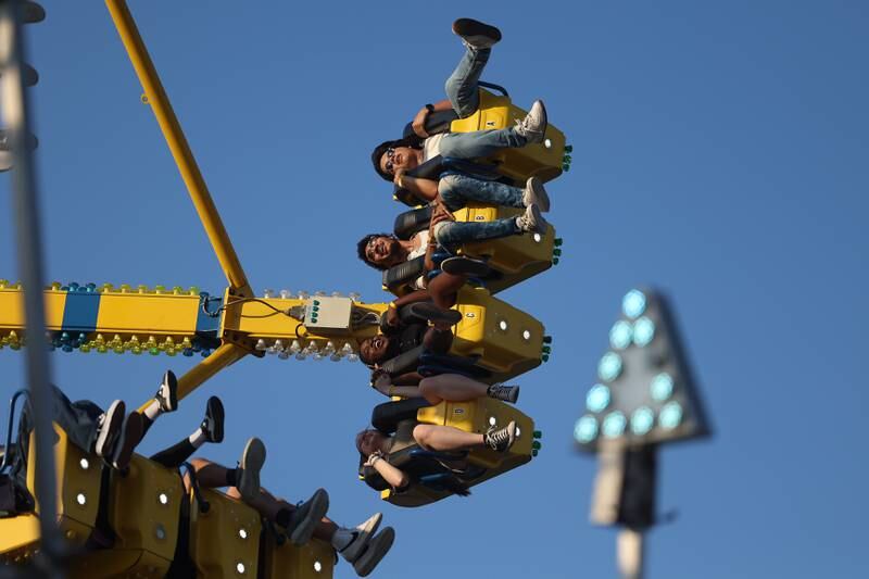 A group enjoys the Freak Out ride at the Taste of Joliet on Friday, June 21, 2024 at Joliet Memorial Stadium.