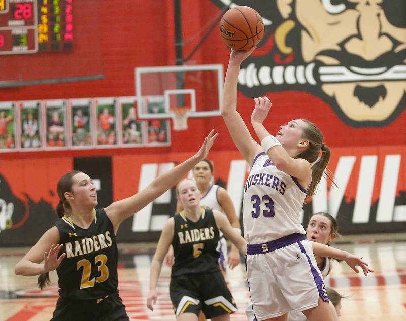 Serena's Jenna Setchell eyes the hoop over Ashton-Franklin Center's Emily Hoffman during the Class 1A Regional final on Thursday, Feb. 15, 2024 at Earlville High School.