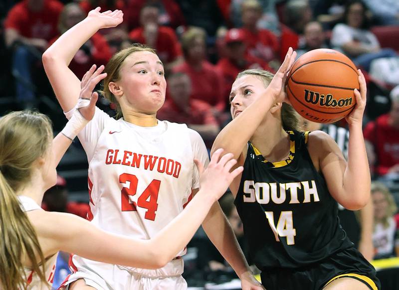 Hinsdale South's Sloane Kiefer goes to the basket against Glenwood's Rowann Law during their game Friday, March 1, 2024, in the IHSA Class 3A state semifinal at the CEFCU Arena at Illinois State University in Normal.