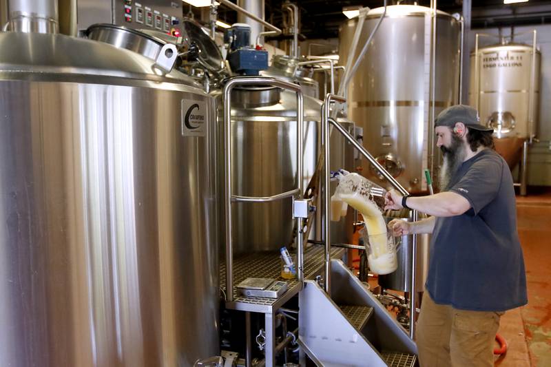 Head brewmaster Ryan Waughon brews beer on Friday, May 3, 2024 at the Crystal Lake Brewing. The brewery is celebrating its 10th anniversary and recently won a bronze award in Brown Porter category at the World Beer Cup in Las Vegas.