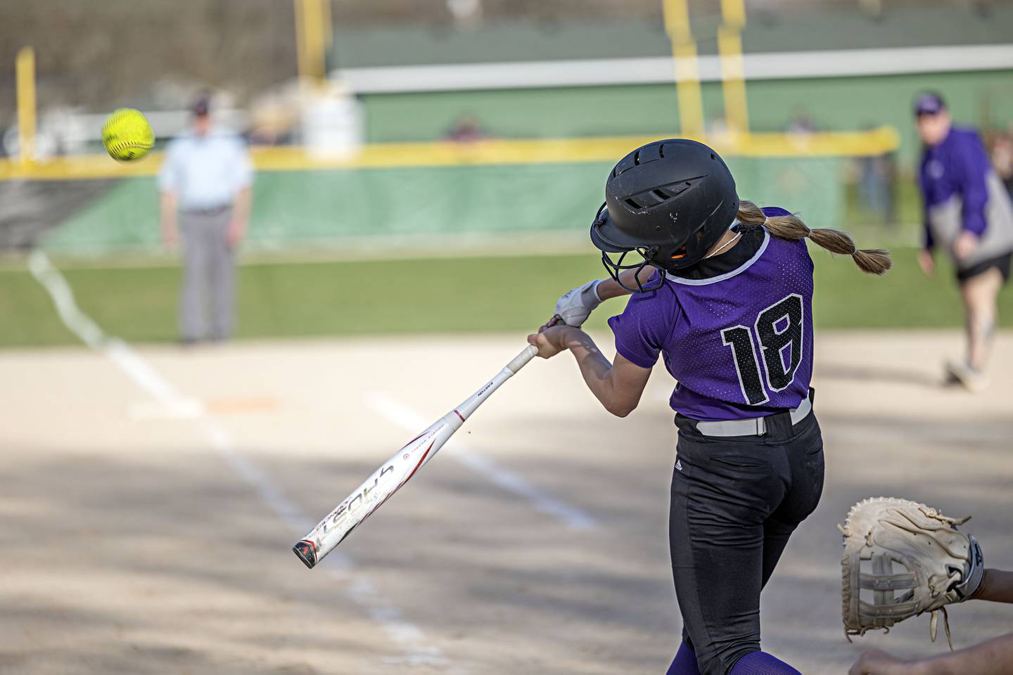 Dixon’s Bailey Tegeler drives the ball against Rock Falls Tuesday, April 11, 2023.