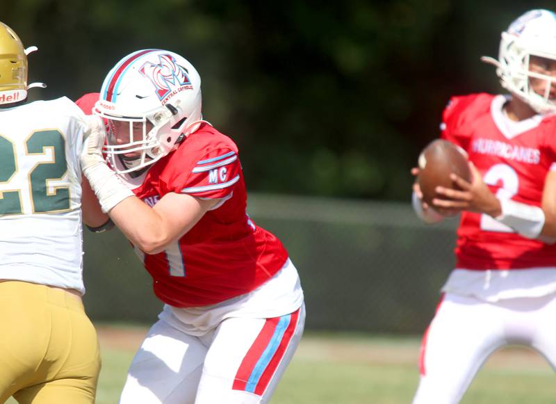 Marian Central’s Eddie Gilmore blocks against Bishop McNamara in varsity football action on Saturday, Sept. 14, 2024, at George Harding Field on the campus of Marian Central High School in Woodstock.