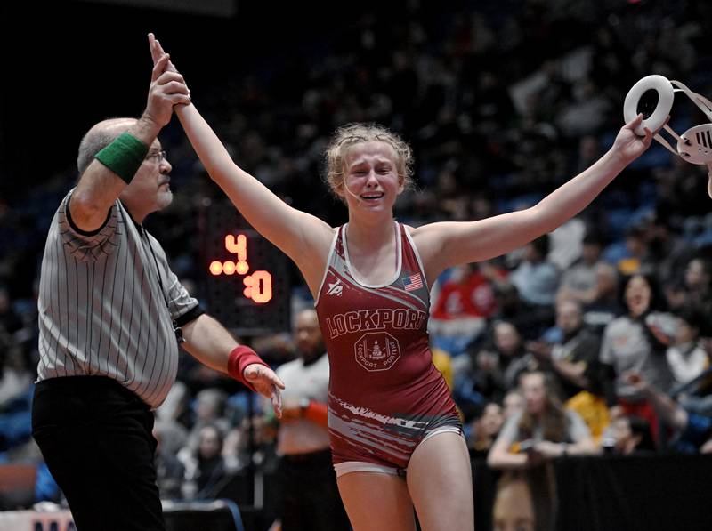 Lockport's Claudia Heeney wins the 130-pound class at the girls wrestling state finals at Grossinger Motor Arena in Bloomington on Saturday, Feb. 24, 2024.