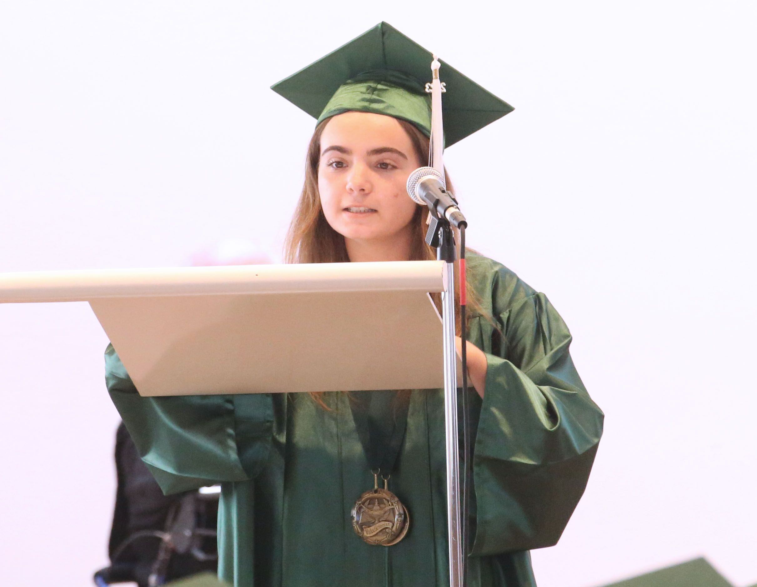 St. Bede valedictorian Gianna Grivetti gives a speech during the Class of 2023 graduation ceremony on Sunday, May 21, 2023, in the Abbey Church at the academy.