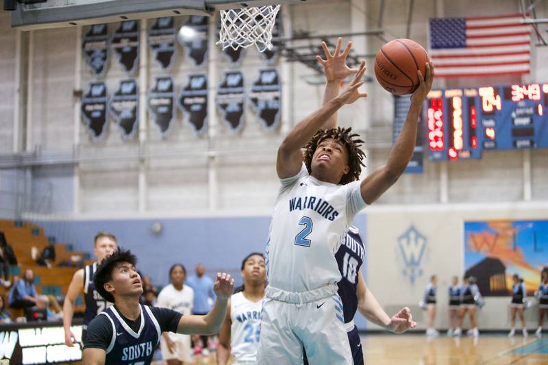 Willowbrook's Otis Powell goes in for the lay up against Downer Grove South on Friday, Feb.2,2024 in Villa Park.