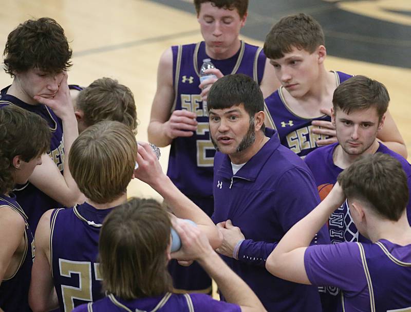 Serena head boys basketball coach Dain Twait talks to his team during a timeout against Chicago  Ellison during the Class 1A Sectional semifinal on Tuesday, Feb. 28, 2023 at Putnam County High School.