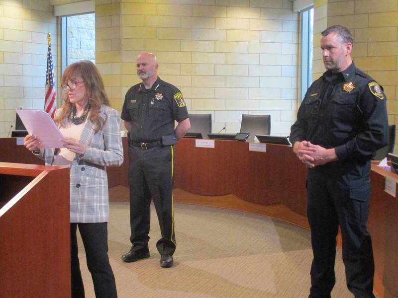 State Sen. Linda Holmes, D-Aurora, introduces Kane County Sheriff Ron Hain, right, and Kendall County Sheriff Dwight Baird during a public safety forum on April 28 at Montgomery Village Hall. (Mark Foster@shawmedia.com)