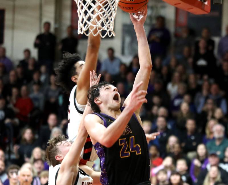 Downers Grove North’s Aidan Akkawi gets the ball to the basket during the Class 4A East Aurora Boys Basketball Sectional final against Bolingbrook on Friday, March 1, 2024.