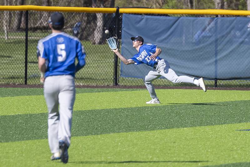 Newman’s Brendan Tunink makes a tough catch in the outfield against Sterling Wednesday, May 3, 2023.