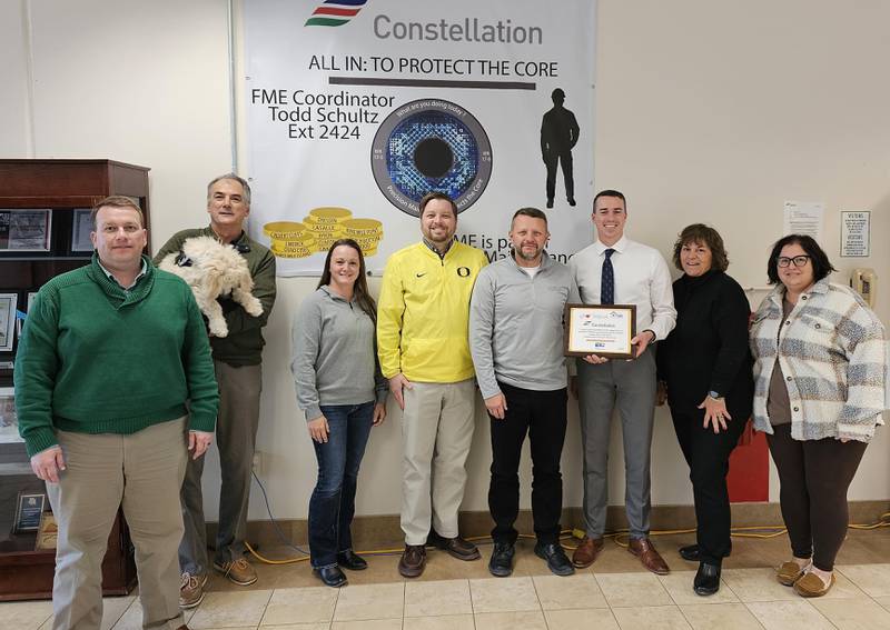 From left to right,  Joe Tozer, Constellation Manager Local Government Affairs; Jeff Hettrick and Lucky, United Way of Eastern LaSalle County Board Chair; Lisa Elmore, Constellation Senior Business Analyst and Labor of Love Planning Committee; John VanFleet, Constellation Site Vice President; Joe Ward, Constellation Director of Maintenance and Labor of Love Planning Committee; Andrew Blackburn, Edward Jones and United Way of Eastern LaSalle County Board Vice-Chair; Sally Honiotes, Executive Director United Way of Eastern LaSalle County; Erica Holocker, Bill Walsh Auto Group and United Way of Eastern LaSalle County board member.