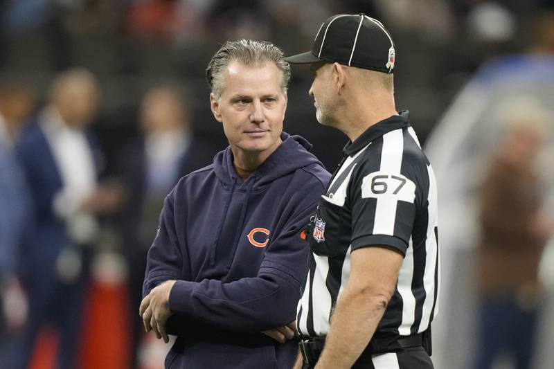 Chicago Bears head coach Matt Eberflus talks to back judge Tony Josselyn before facing the New Orleans Saints in New Orleans, Sunday, Nov. 5, 2023.