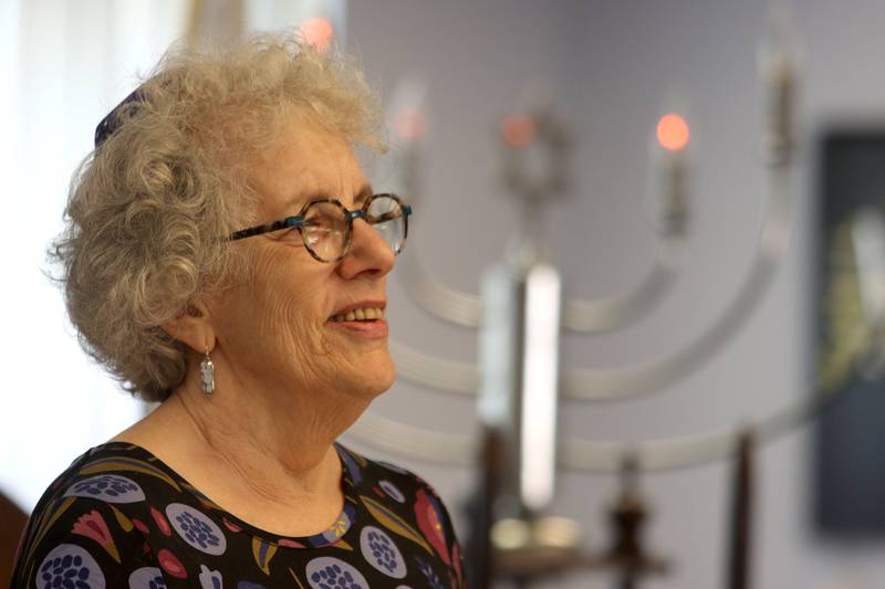 Rabbi Maralee Gordon speaks as the McHenry County Jewish Congregation held a deconsecration ceremony at their Ridgefield Road location in preparation for a move to the Tree of Life Unitarian Church in McHenry on Sunday, August 18. Mezuzot were removed from doorways and the Torah Scrolls were removed from their ark and transported  to the new building as worshipers consecrated the new building as their synagogue.