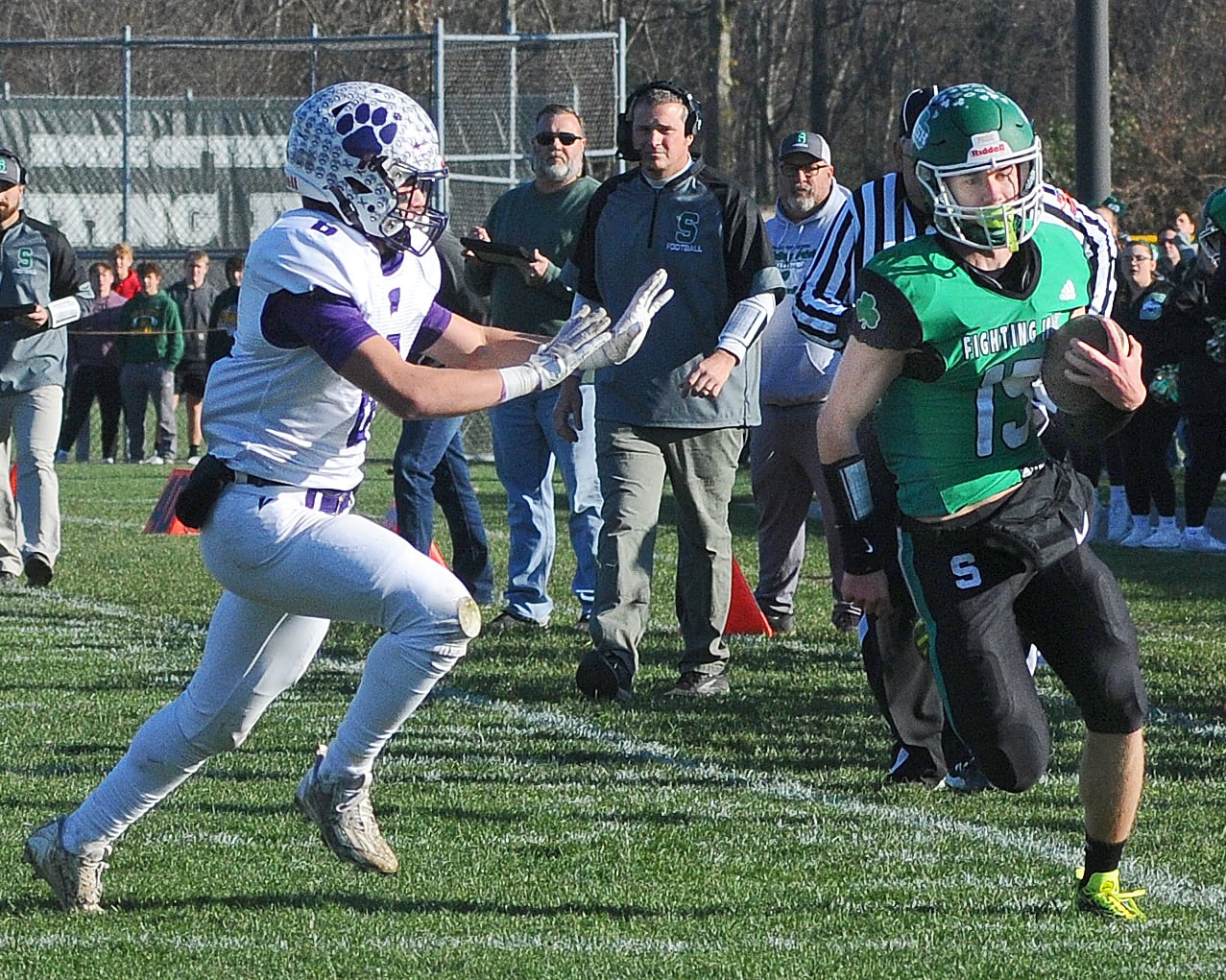 Seneca quarterback Paxton Giertz attempts to outrun Wilmington’s Matt Swisher down the sideline during the opening quarter of last season's IHSA Class 2A playoff quarterfinal at Seneca.