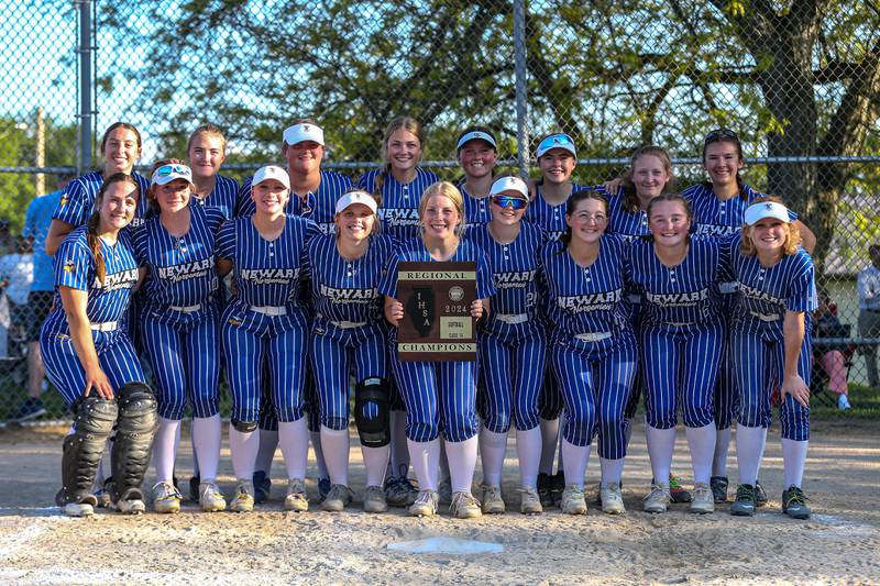 Newark poses with the Class 1A Newark Regional final game plaque after defeating St. Edwards. May 17th, 2024.