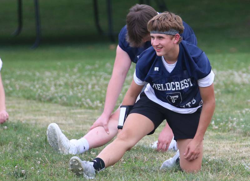 Fieldcrest quarterback Kash Klendworth stretches before practicing on Monday, July 8, 2024 at Fieldcrest High School.