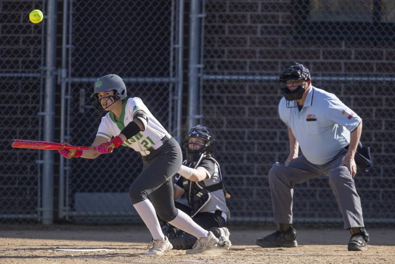 Aurora Weber drives in a run with her sacrifice bunt against the WFC Warriors on April 15, 2024 at Seneca High School.