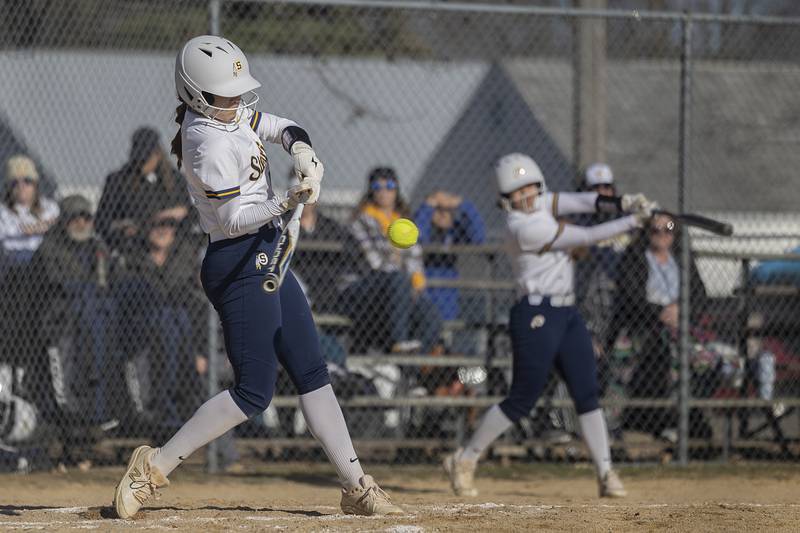 Sterling’s Mya Lira drives the ball to left for a single against Dixon Tuesday, March 19, 2024 in Dixon.