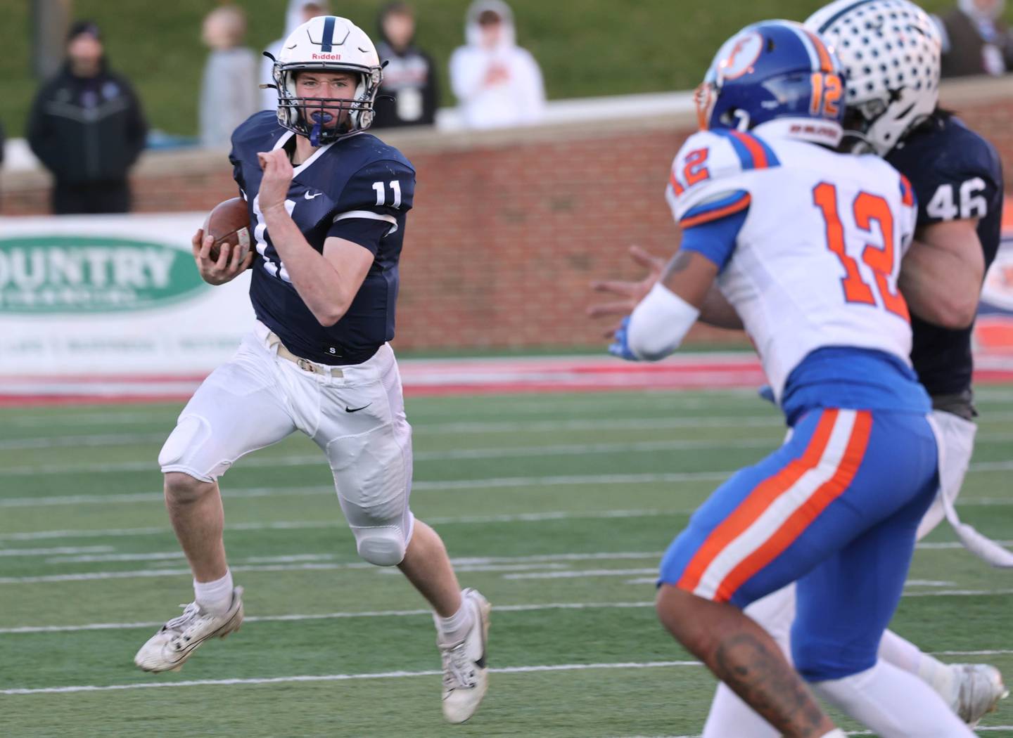 Cary-Grove's Peyton Seaburg tries to get outside the East St. Louis defense Saturday, Nov. 25, 2023, during their IHSA Class 6A state championship game in Hancock Stadium at Illinois State University in Normal.