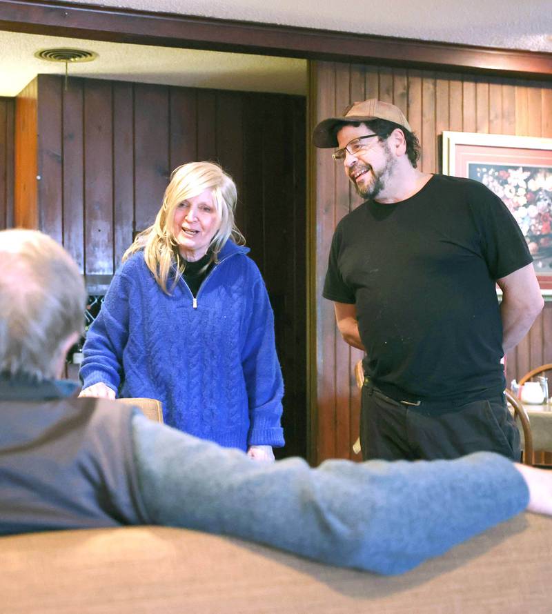 The Hillside Restaurant owners Mary and Gavin Wilson (right) talk to regulars Vincent Boone and Vicki Erwin, of DeKalb, Wednesday, Feb. 22, 2023, at eatery in DeKalb. Hillside will soon be closing its doors after 68 years in business.