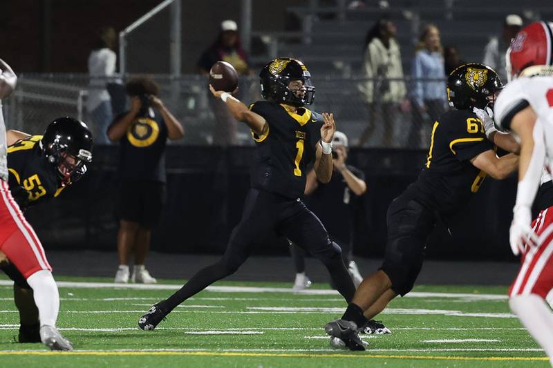 Joliet West’s Antoine Brooks passes against Yorkville on Friday, Sept. 13, 2024 in Joliet.