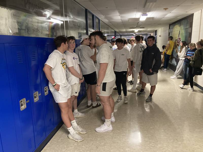 Fans wait out the tornado warning before the start of the Crystal Lake South High School basketball sectional semifinal game at Kaneland High School in Maple Park on Feb. 27, 2024.