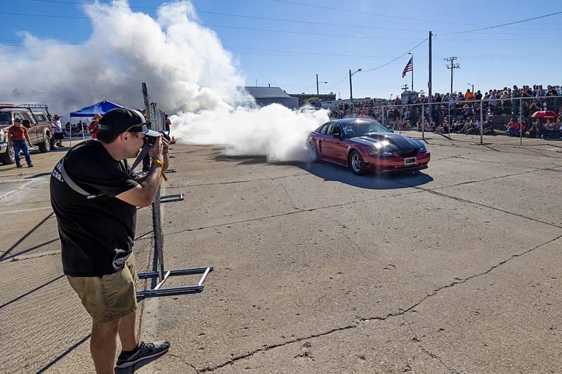 Plumes of smoke take to the air as the high-octane machines burn rubber down the strip Monday, June 10, 2024.